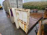 a dump truck that is sitting in the rain