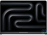 une image représentant un ordinateur portable sur fond noir