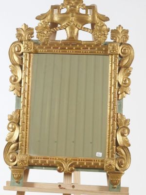 a mirror on a stand with a mirror on it