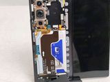 a picture of a cell phone with a broken battery