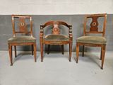 three chairs with a brown upholstered seat and a brown upholstered seat