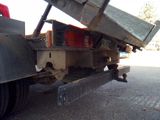 an image of a flatbed truck with a flat bed