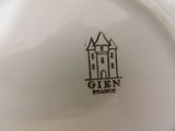 a close up of a plate with a castle on it