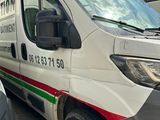 a van that is parked on the side of the street