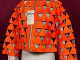 an orange jacket on a mannequin mannequin mannequin mannequin mannequin mannequin mannequin mannequin mannequin