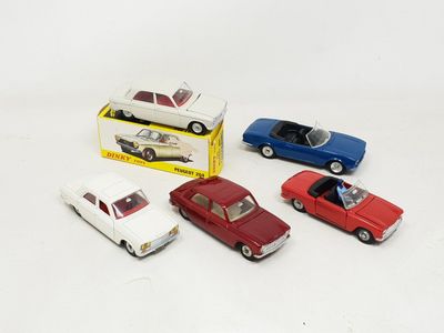 several toy cars are lined up in a row in front of a box