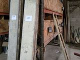 several pieces of wood stacked on top of each other in a warehouse