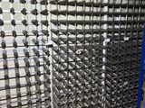 a picture of a rack of wine bottles in a wine cellar