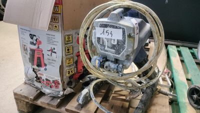 a box and a hose on a pallet with a box in the background
