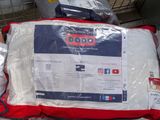 a bag that is sitting on top of a pile of luggage