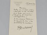 une vieille lettre manuscrite sur une feuille de papier comportant des inscriptions