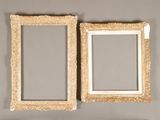 pair of antique gold picture frames on a wall