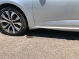 a car that is parked on the side of the road