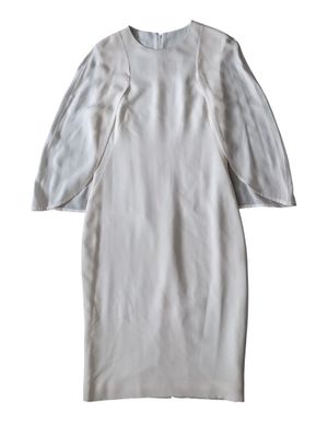 an image of a white dress on a white background