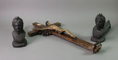 three statues of jesus on the cross and a statue of jesus on the cross