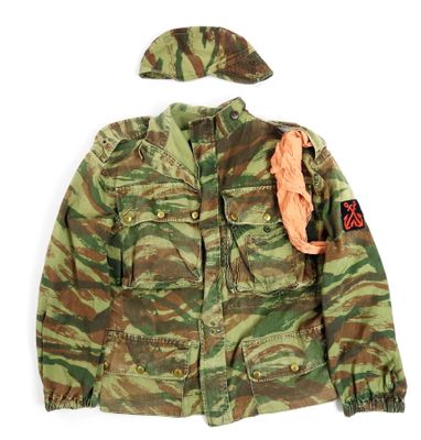an image of a child ' s camouflage jacket and hat