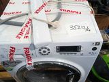 a stack of washing machines on a pallet in a warehouse