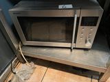 a microwave that is sitting on top of a table