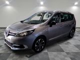 an image of a silver car in a showroom