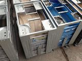 a lot of metal boxes that are stacked together