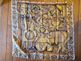 an image of a scarf on a wooden floor