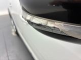 a close up of a car ' s bumper with a dent in it