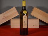 a bottle of wine that is sitting on a table