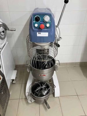 an image of a kitchen with a mixer and other appliances