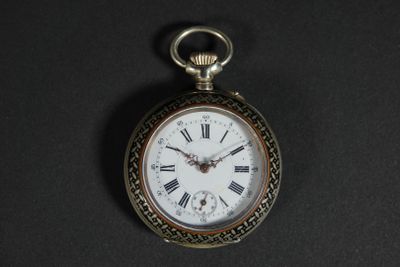 MONTRE DE GOUSSET en métal argenté. Le cadran émaillé blanc …