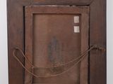 an old wooden picture frame with a rope hanging from it ' s side