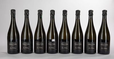 six bottles of wine lined up in a row on a table