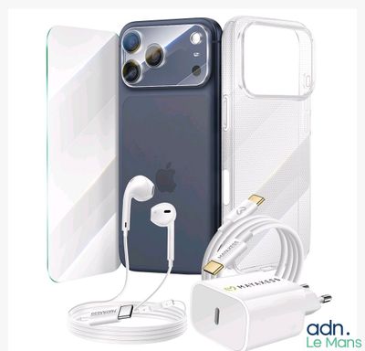un téléphone avec des écouteurs et un chargeur à côté