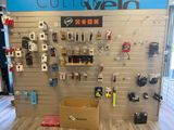 a display of cell phones on the wall in a store