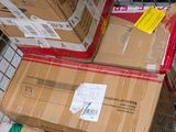 several boxes are stacked on top of each other in a shopping cart