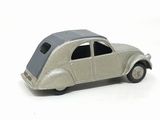 a toy car that is sitting on a white surface