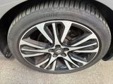 a close up of a tire on a car ' s rim