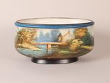 a bowl with a painting of a bridge on it
