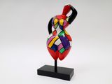 sculpture of a woman ' s torso on a black stand
