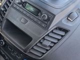a car dashboard with a cell phone holder on top of it