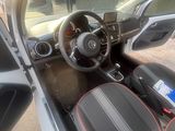 the interior of a car with a dashboard and a steering wheel