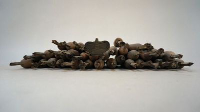 an image of a pile of mushrooms sitting on top of a white surface