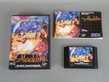 three video game cartridges sitting on top of a table next to each other