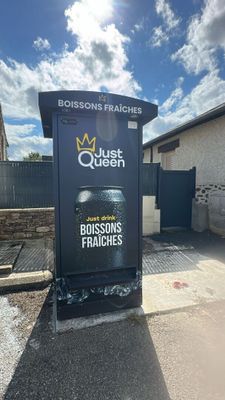 a sign for a restaurant on the side of the road