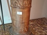 a vase that has a bunch of flowers inside of it