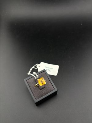une image représentant un porte-clés sur lequel est accrochée une clé