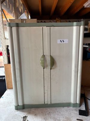 a refrigerator that is sitting on a table in a room