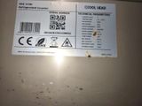 a sticker on the back of a machine that has a barcode on it