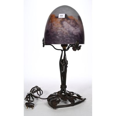 an image of a table lamp with a glass shade on top of it