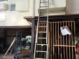a picture of a room that has a ladder in it