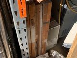 a pile of boxes and boxes on the floor of a warehouse